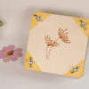 Presse à fleurs motif ombelle coins jaunes